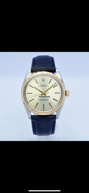 Rolex | Oyster Perpetual | 1005 | Steel | 33 mm | Leather | Gold | Automatic