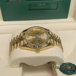 Rolex | Day-Date | 228238 | Yellow gold | 40 mm | Yellow gold | Champagne | Automatic