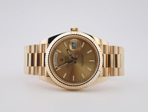 Rolex | Day-Date | 228238-0006 | Yellow gold | 40 mm | Yellow gold | Champagne | Automatic