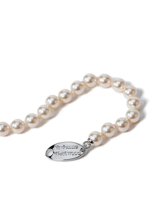 Orb-plaque pearl bracelet