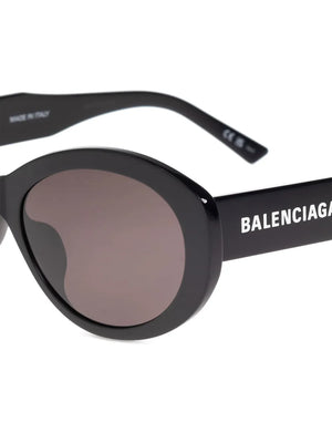 oval-frame tortoiseshell sunglasses