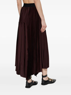 Jax pleated asymmetric skirt