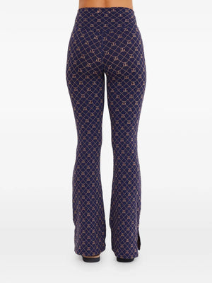 Ezra geometric-print trousers