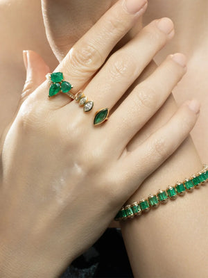 diamond and emerald cluster band ring