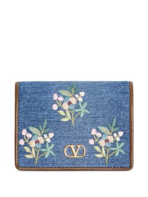 VLogo Signature wallet in denim with floral embroidery