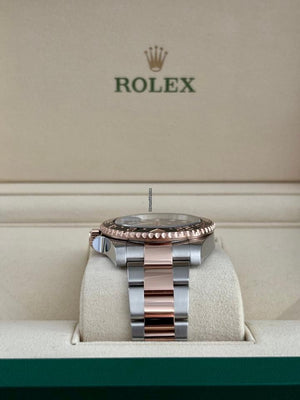 Rolex | GMT-Master II | 126711CHNR | Steel | 40 mm | Gold/Steel | Black | Automatic