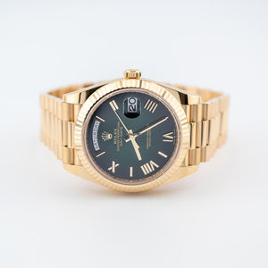 Rolex | Day-Date | 228238 | Yellow gold | 40 mm | Yellow gold | Green | Automatic