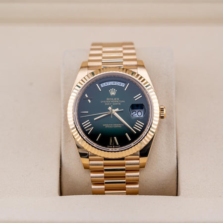 Rolex | Day-Date | 228238 | Yellow gold | 40 mm | Yellow gold | Green | Automatic
