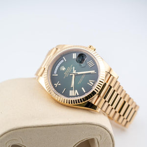 Rolex | Day-Date | 228238 | Yellow gold | 40 mm | Yellow gold | Green | Automatic