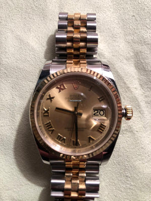 Rolex Oyster Perpetualyear 2009. Vintage. 18k gold. Stamps of authenticity.