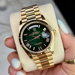Rolex | Day-Date | 128238 | Yellow gold | 36 x 43 mm | Yellow gold | Green | Automatic