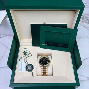 Rolex | Day-Date | 128238 | Yellow gold | 36 x 43 mm | Yellow gold | Green | Automatic
