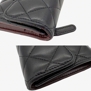 CS097 - CHANEL Vintage Black Lambskin Wallet