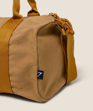 Gymshark Strength Dept Mini Canvas Duffle Bag Antique Gold