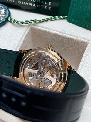 Rolex | 1908 | 52508 | Yellow gold | 39 mm | Crocodile skin | Black