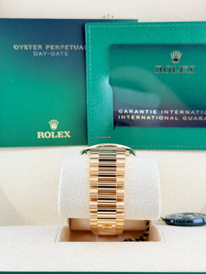 Rolex | Day-Date | 128348RBR | Yellow gold | 36 x 43 mm | Yellow gold | Green | Automatic