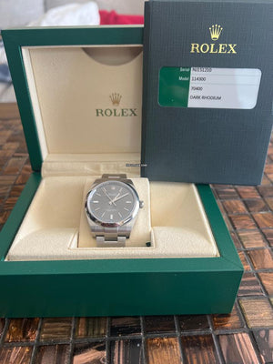 Rolex | Oyster Perpetual | 114300 | Steel | 39 mm | Steel | Red | Automatic
