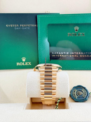 Rolex | Day-Date | 128348RBR | Yellow gold | 36 x 43 mm | Yellow gold | Green | Automatic